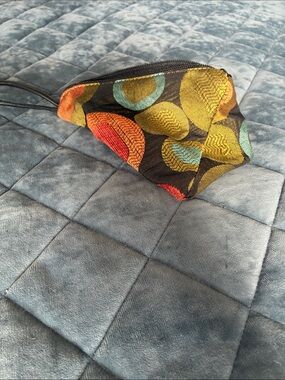 Erda triangle Colorful Pattern Wristlet Pouch with beads.